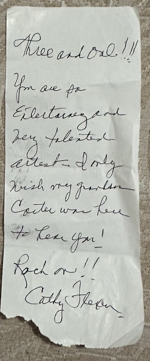Handwritten note from a fan: "Three and One!!! You are so entertaining and very talented artists. Rock on!!"