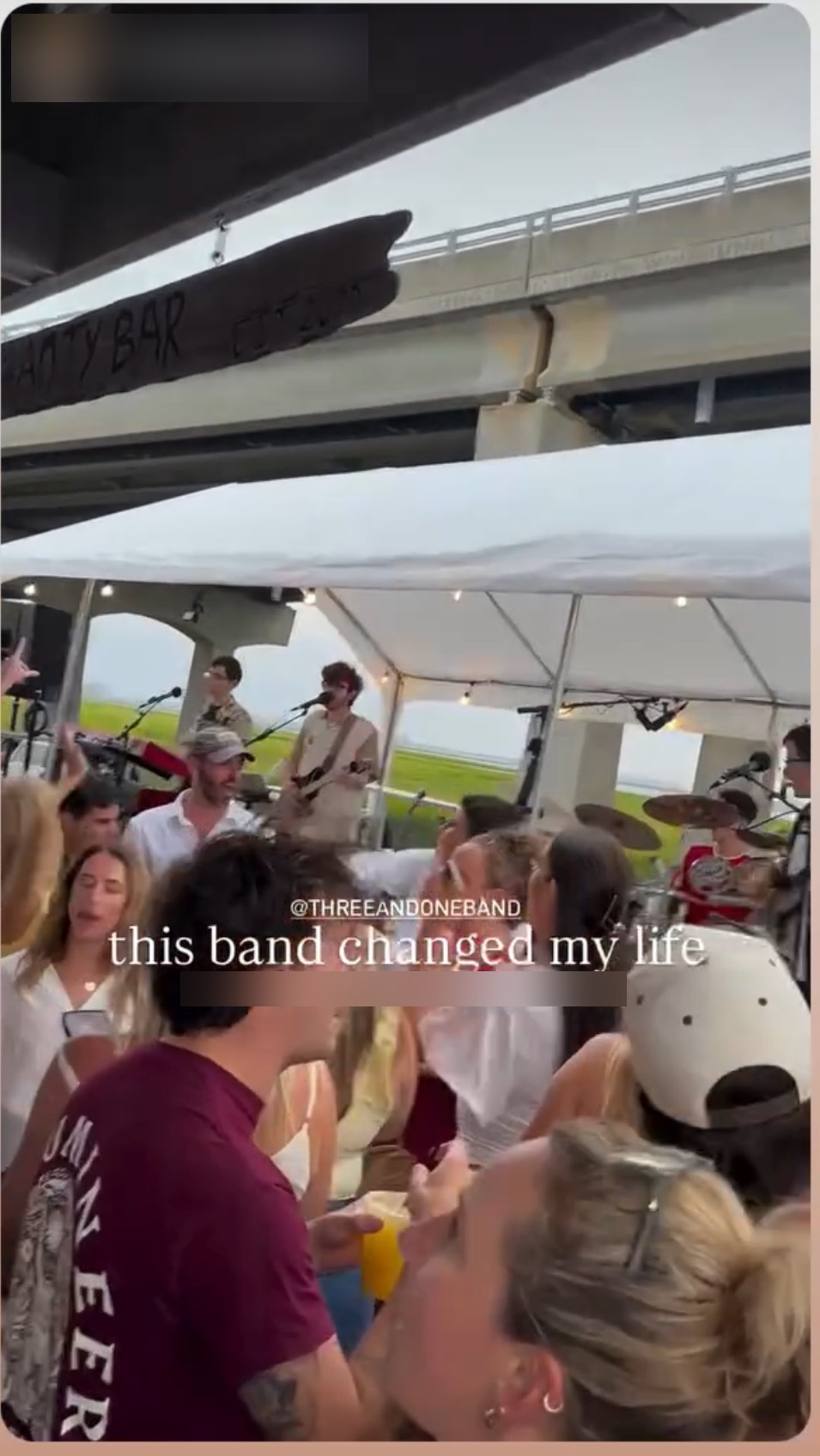 Instagram story of a packed crowd at a Three and One show captioned "this band changed my life"